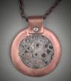 "Wheels of Time" copper and steel pendant 1.50 x 1.75, comes with a 20 chain.