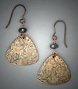 Hand-sculpted Bronze earrings with Trillion shaped flower pattern below a 6mm, Blue flash Labradorite bead; L= 2 1/4 (including ear wire) W= 1 1/8.