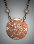 Mokume Gane pendant: An organic mandala of living cells in rippling water.  Dia.=  1 1/2 Dia.;  Hand sculpted mandala pendant of copper with bronze inlaid water ripples and central cells of Mokume Gane.  2 - 8mm. solid bronze beads on either side.  Hangs on a 24 adjustable antiqued bronze chain.