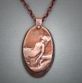Aglow/Oval; Bronze on copper; fine texture background; 1 x 2; chain 18