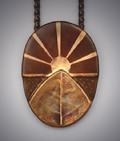 Setting Sun  Copper pendant with bronze leaf and bronze inlay of setting sun on copper backing. Measures 2h x 1 ½w and hangs on 19" copper chain.