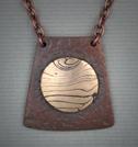 “Moon Rising” pendant, Bronze/Steel Mokume Gane on Copper 1.25” x 1.25”,  22” chain.