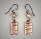 Bronze and Copper earrings - vertical rectangle hanging from bronze ball. 3/8w x ¾h.