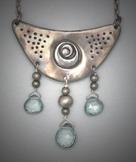 Steel Spiral Necklace; L=  1 3/4”   W= 1 7/8”;  Hand Sculpted winged Spiral Necklace with 3 Aquamarine crystals hanging below, on a 19” Steel Chain.