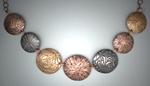 7 Circles Necklace - Rose and Friendly Bronze & PG Steel.  Circles 1dia & ¾dia.  18 bronze chain