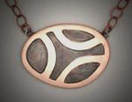 Bronze pendant with black grout inlay