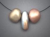 3 Hollow Forms  2;  Bronze, Copper & Steel hollow forms necklace on Memory Wire. 3 beads together measure 2 ½ w & center bead is 1 ½ h.